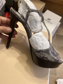 Authentic, Brand new never used Michael Kors python leather size 8
