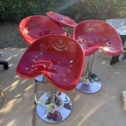 4 Red Metal Tractor Seat Barstools 