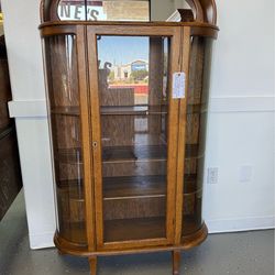 Antique tiger, oak curio cabinet