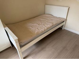 Twin bed with mattress