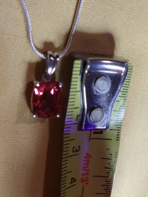 POUDRETTEITE, (RARE) *EMERALD CUT* FACETED GEMSTONE NECKLACE. BEAUTIFULLY INTRICATE UNDERCARRIAGE: (3/4") STERLING.*(16")(NC-8099) MEANING BELOW!