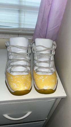 Air Jordan 11 Yellow Snakeskin Sneakers