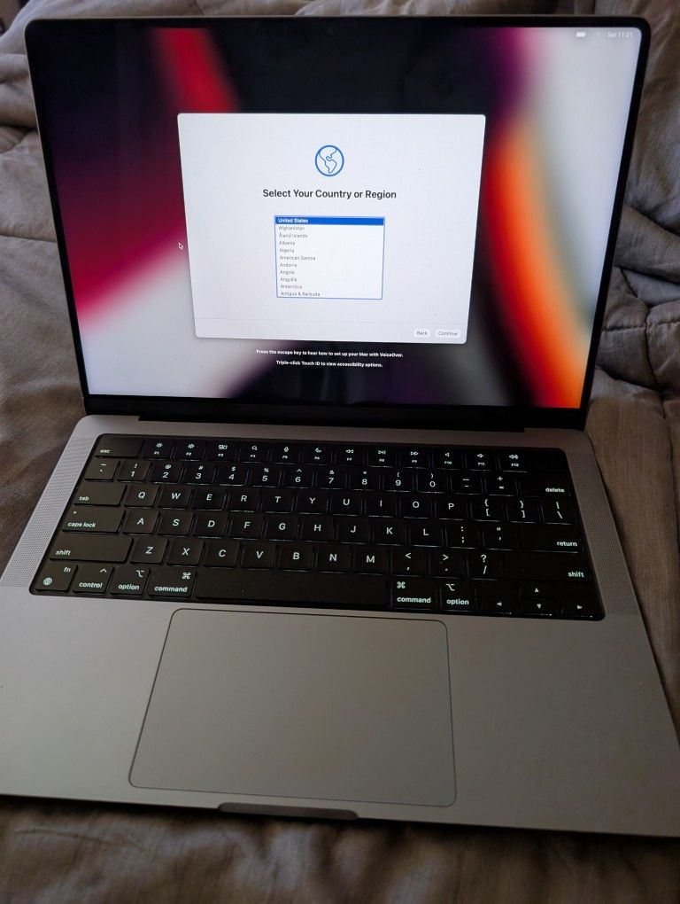 2021 Apple MacBook Pro 14" is a laptop with an M1 Pro chip