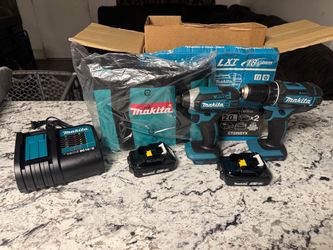 Makita set new with two batteries 1.5 ah comes with a bag in the charger new