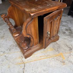 Vintage Table with an integrated book  rack and cabinet .