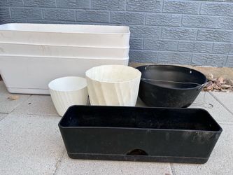 Planters, self-watering