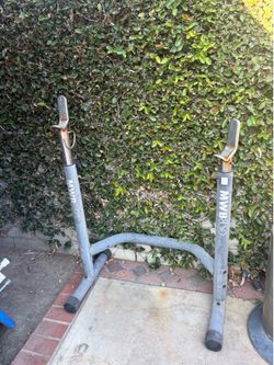 Bench press bar holder