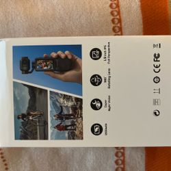 Compact Action Camera with Rotating Lens