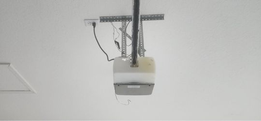 Overhead Garage Door Opener Broken Spring Off Track Replace Adjustment And Parts
