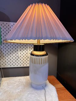White vase base table lamp