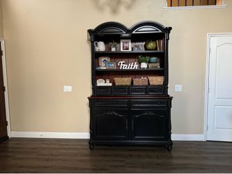 Black hutch with warm wood tone