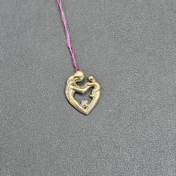 14kt YG Small Diamond Mother/Child Pendant. ASK FOR RYAN. #(contact info removed)11