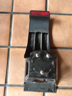 Stock TJ Jeep spare tire carrier