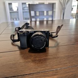 Sony Alpha 6000 24.3 MP Mirror less camera along with 128 GB card