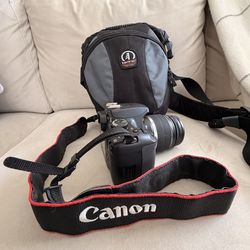 CANON EOS REBEL XS DSLR CAMERA + UV PROTECTION FILTER
