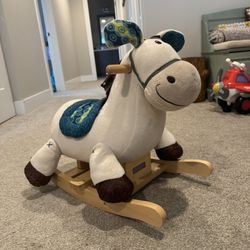 Toddler Riding Horse