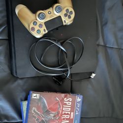 PS4 with controller and 4 games