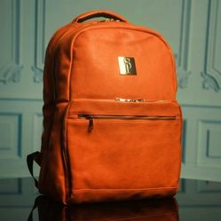 Sole Premise Orange Leather Commuter Bag