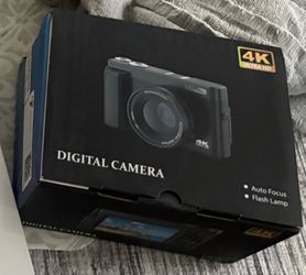 , JBL ear buds, camera, microscope,