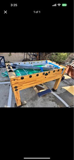 Foosball table with the whole set