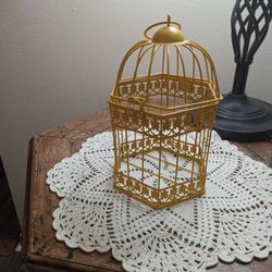 A Vintage Yellow Bird Cage
