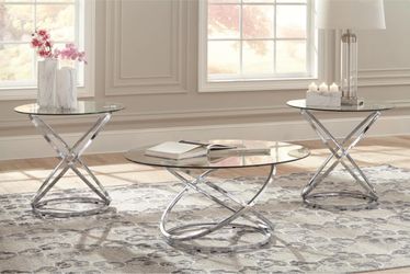 Moving Sale - Coffee  table - Chrome-tone metal rings are topped with clear glass with polished edges for a masterfully modern look with minimal fuss.