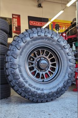 LT38x13.50R18 Toyo Open Country RT Pro + 18” Rim Kmc Wheels in Satin Black
