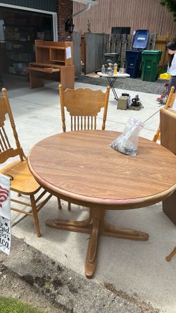 Solid oak table and 4 chairs