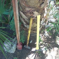 Post Hole Diggers, Large Sledge Hammer, and Pick.