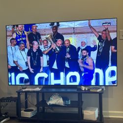 65" LG tv with stand for sale. Like New