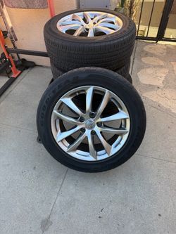 Infiniti sedan full set tire & rim need gone asap