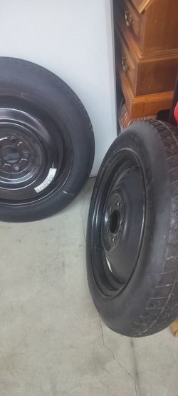 FOR SALE TWO NEW SPARE TIRES.