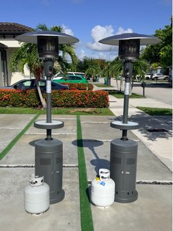 2 Outdoor Propane Patio Heaters – Excellent Condition – Includes Tanks & Covers