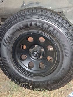 All Terrain Tire on Black Steel Wheel