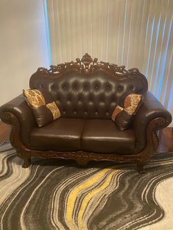 Dark brown leather three pieces sofa set and white 71” tv stand.