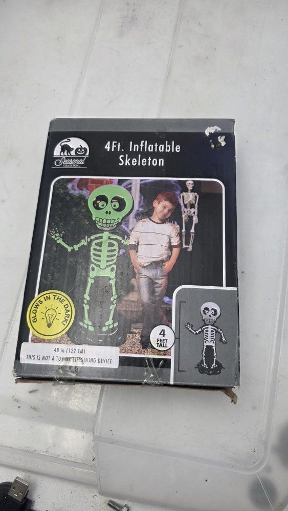 4 Feet Tall Inflatable Skeleton Glows In The Dark Indoor/Outdoor Halloween