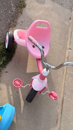 Girl pink tricycle bike