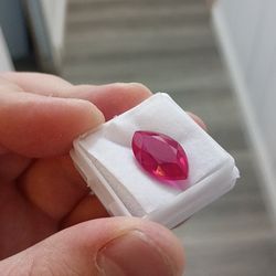 7.45 carat emerald and 9.05 carat marquise cut ruby