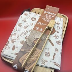 Pebbly bakers set; bread board, toast tongs, and bread bag