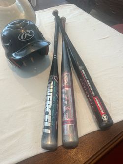 Batting Helmet and 3 Softball bats
