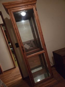 Tall oak cabinet