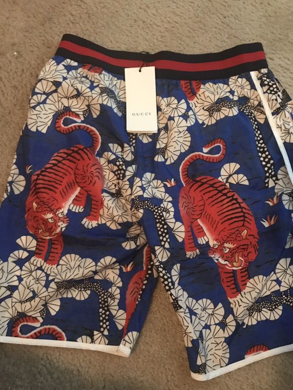 Gucci swim trunks $150
