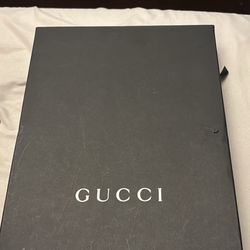 Gucci Microguccissima black leather clutch.