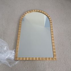 beautiful brand new 24 by 38.75 inch decorative mirror.  (MUST SELL TODAY)