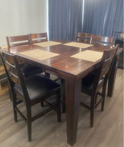 Gently used dining table with chairs