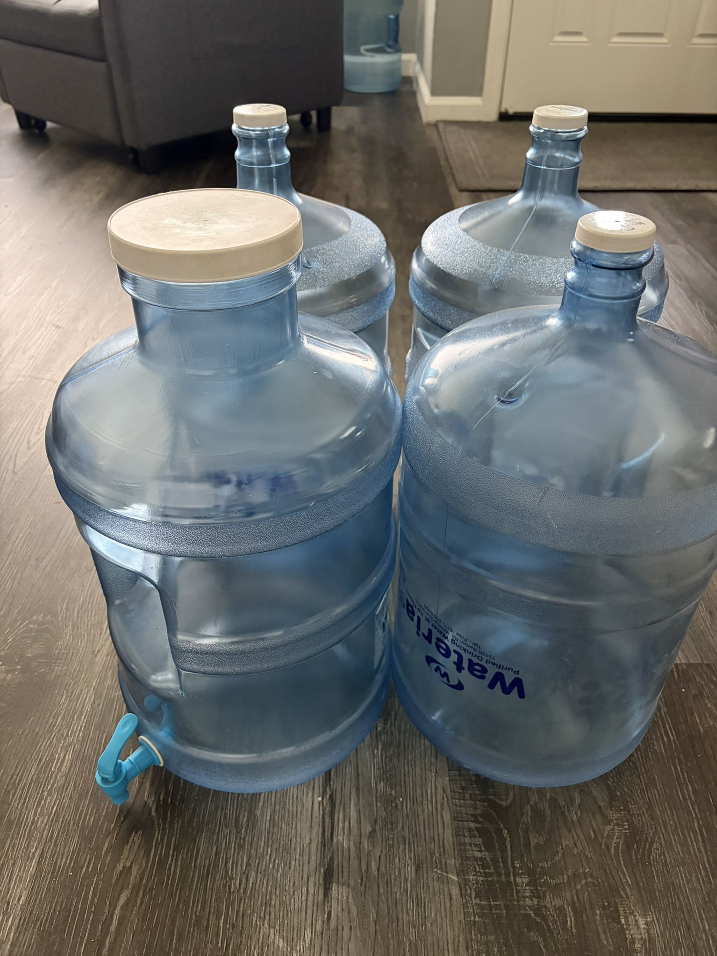 4 Empty Water Bottles
