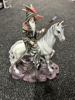 Wizard On Unicorn Statue