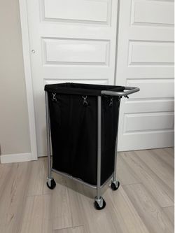Laundry hamper with wheels