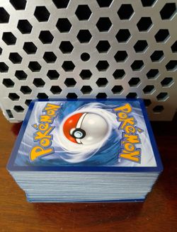 A Large Deck Of Blue Pokemon Cards 