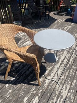 Nice wicker patio chair with metal table